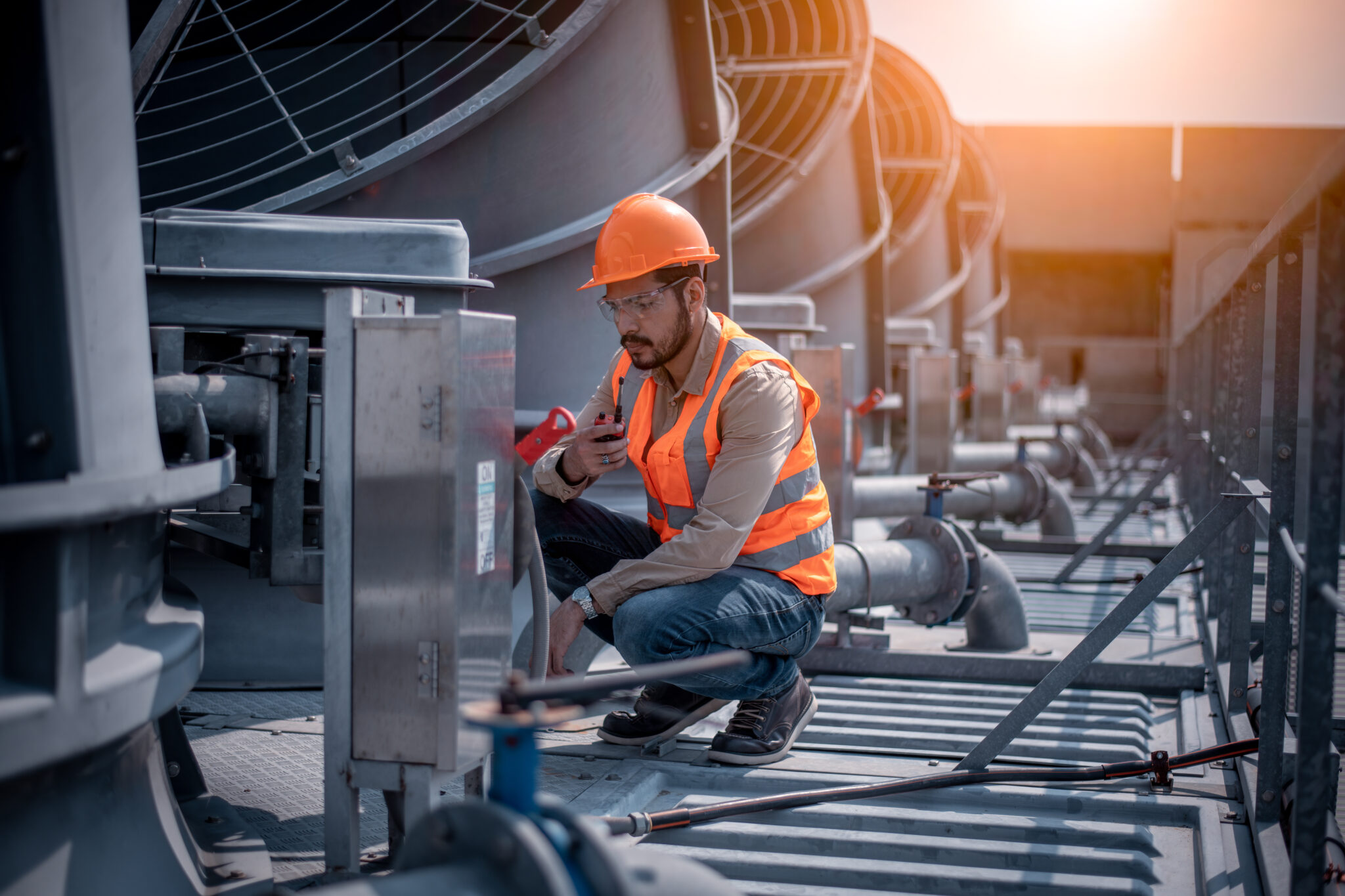 HVAC Leads Generation Company HeartBeep Marketing NH man repairs HVAC system on a roof