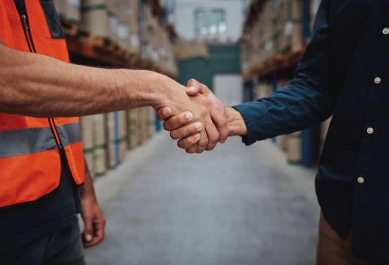 HeartBeep Marketing HVAC Lead Generation, Close-up of unrecognizable men concluding agreement about container rent and shaking hands