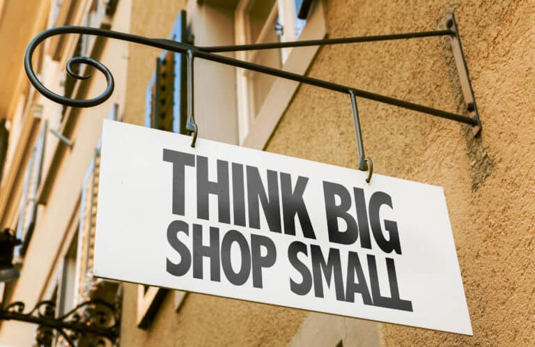 HeartBeep Marketing NH marketing in New Hampshire, Think Big Shop Small sign in a conceptual image