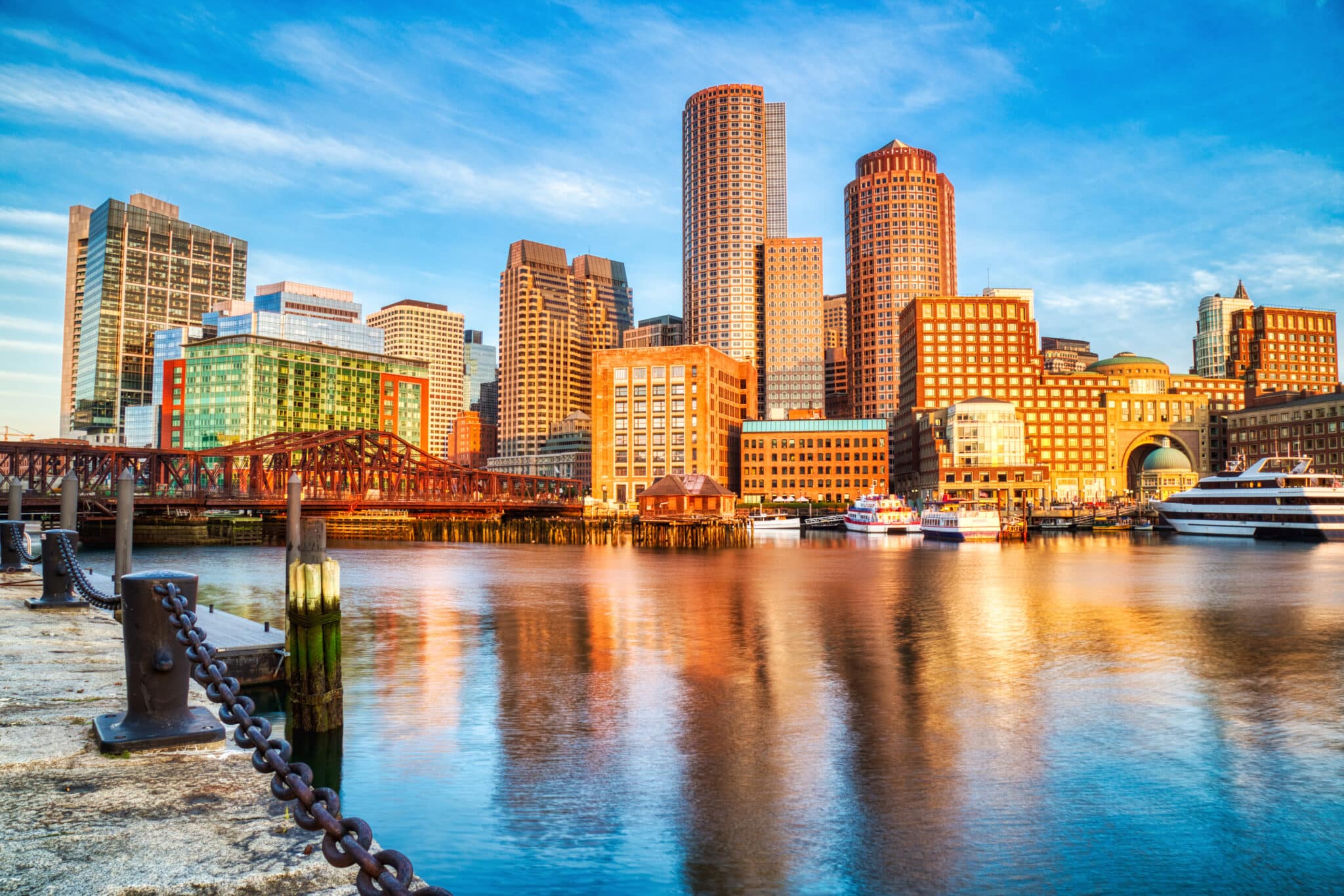 Heartbeep Marketing NH SEO Agency in Boston, Boston Skyline with Financial District and Boston Harbor at Sunrise, USA Keywords: boston, harbor, skyline, disk, illuminated, sunrise, cityscape, skycraper, night, massachusetts, city, financial, district, financial district, usa, england, new, new england, architecture, downtown, dusk, business, tourism, urban, america, landmark, famous, metropolis, real, modern, building, sightseeing, walkway, view, panoramic, waterfront, street, estate, building, vibrant, sea, ship, boat, reflection, light