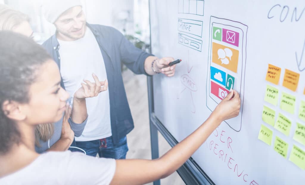 Heartbeep Marketing NH SEO Agency in Boston, Designers drawing website ux app development.