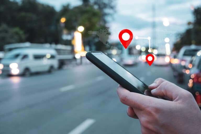 People use smartphone to check map to travel with internet and gps application for vacation. Heartbeep Marketing NH Portsmouth SEO